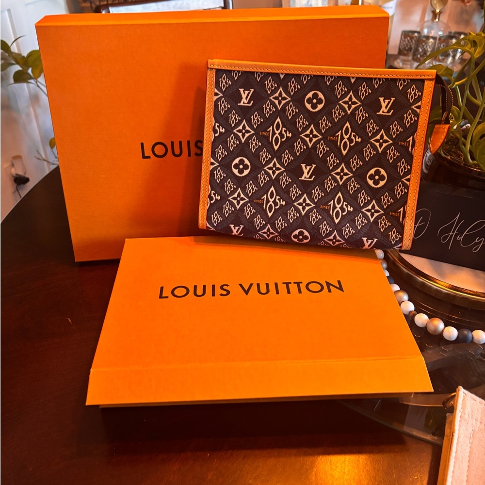 Louis Vuitton
Louis Vuitton Toiletry Blue Since 1854 Canvas Pouch